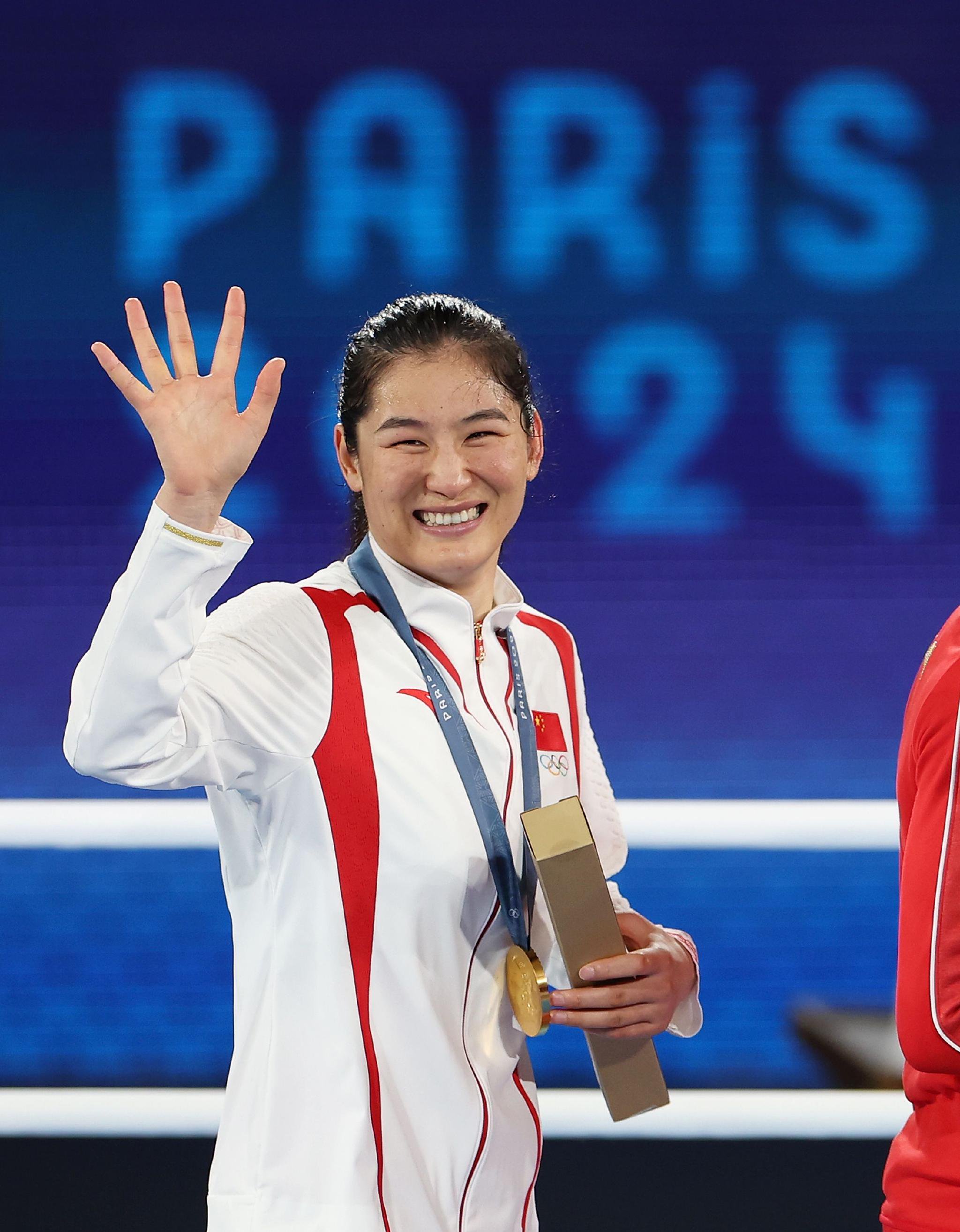 李倩终于在奥运会上摘金圆梦。 图/新华社