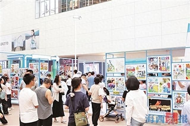“我要看苏杯”中小学生主题海报展吸引不少市民观看。记者 陈理杰 摄