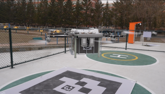 12月10日，一条高校低空物流配送航线在东北师范大学净月校区正式投入运营。（受访者供图）