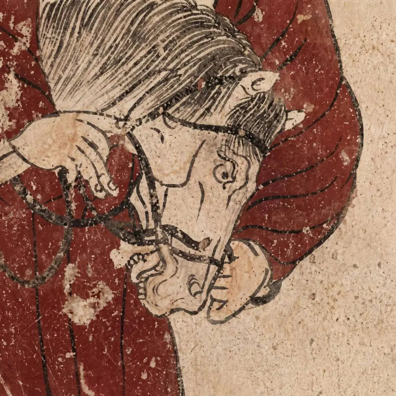 唐玄宗早年最心爱的韦贵妃墓中壁画上被套上笼头的马，表情极为生动。