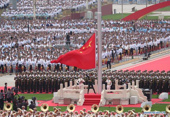 A flag-raising ceremony is held during a grand gathering celebrating the Communist Party of China (CPC) centenary at Tian'anmen Square in Beijing, capital of China, July 1, 2021. (Xinhua/Lan Hongguang)