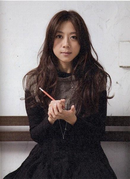 陈绮贞被拍与中年男激吻,后者被指已婚且有两子