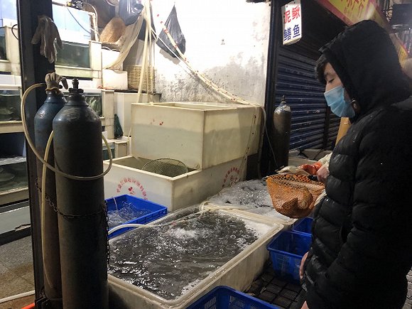 肺炎后的武汉华南海鲜城:卫生消毒比以往都频