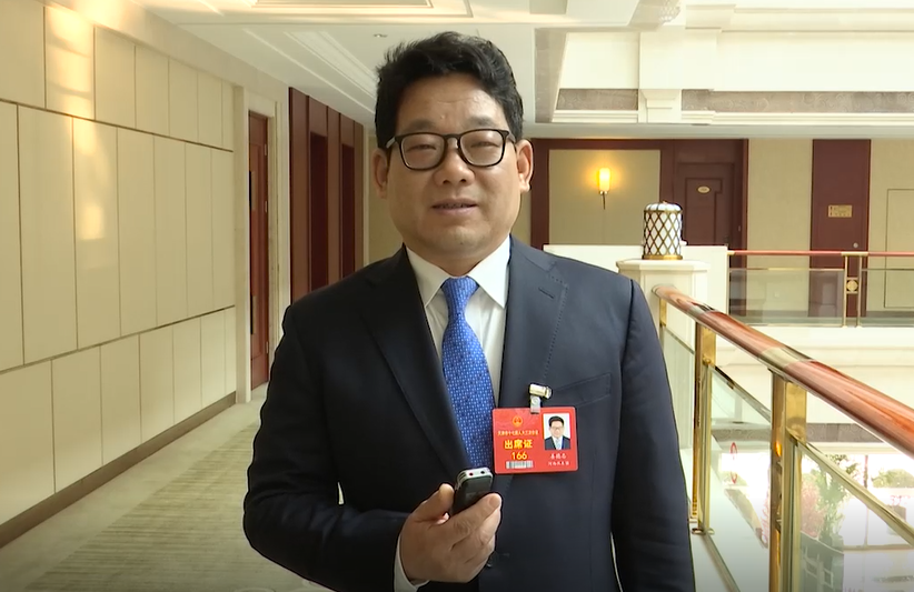 天津市河西区区长姜德志向人民网网友拜年