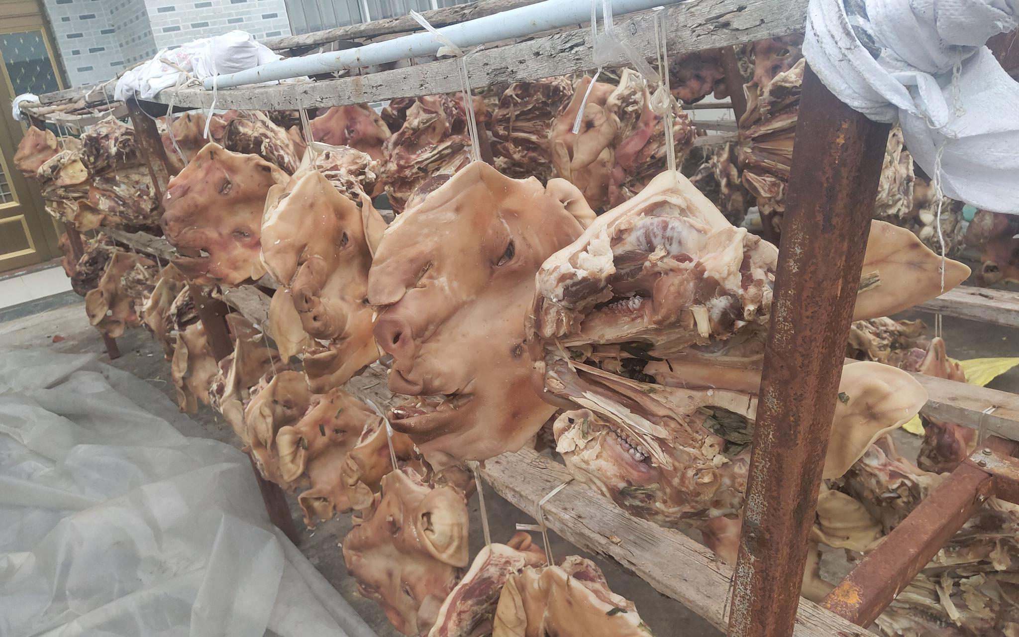 今年肉价涨了 季桥镇咸猪头"没想到能卖这么好"