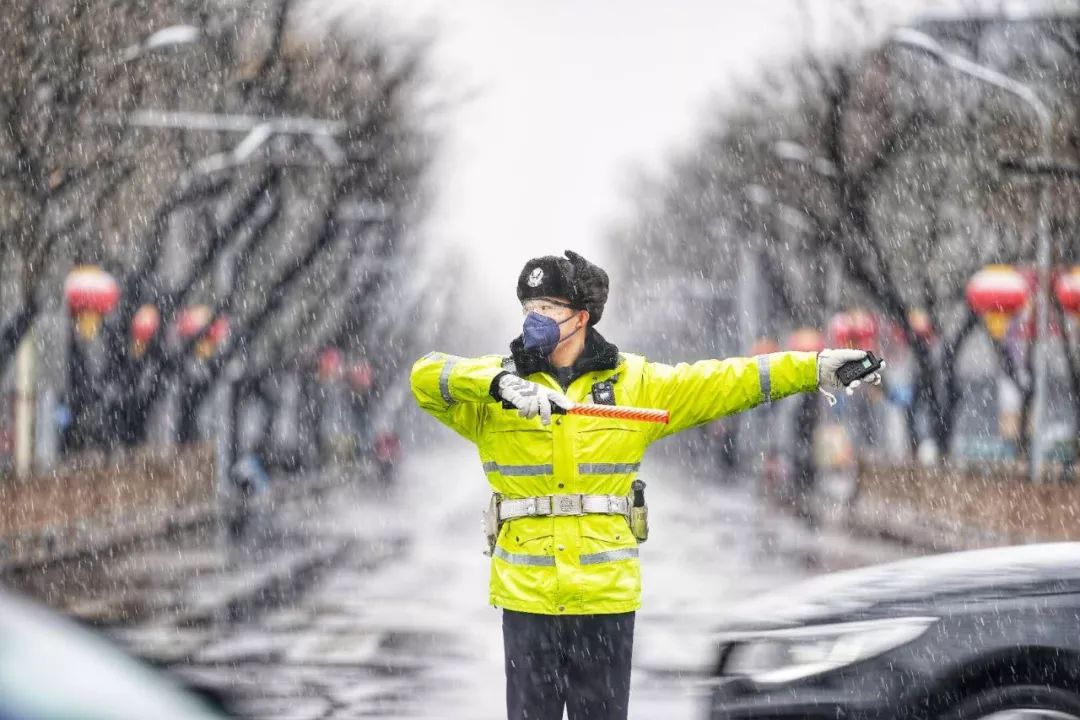 北京风雪中那最美的身影