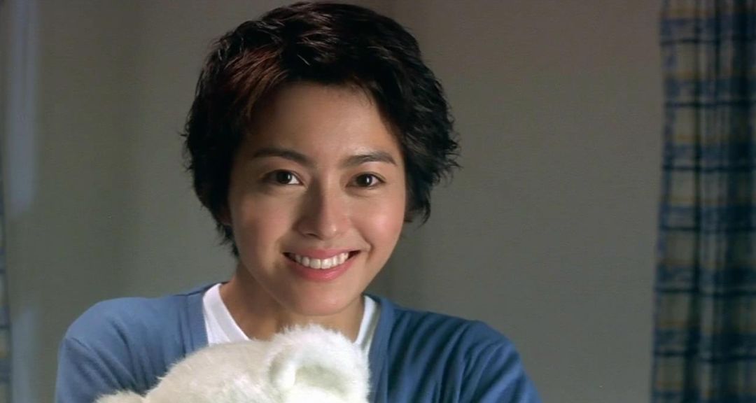 和唱着《胆小鬼》的香港一代玉女派掌门人gigi呢~电影《百变星君》