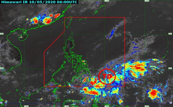 △菲律宾国家气象局10日14时发布的卫星云图，红圈TD表示热带低压