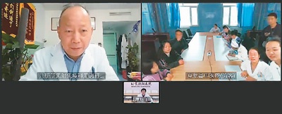图为儿研所风湿免疫科周志轩主任（左）远程会诊。北京市朝阳医院供图