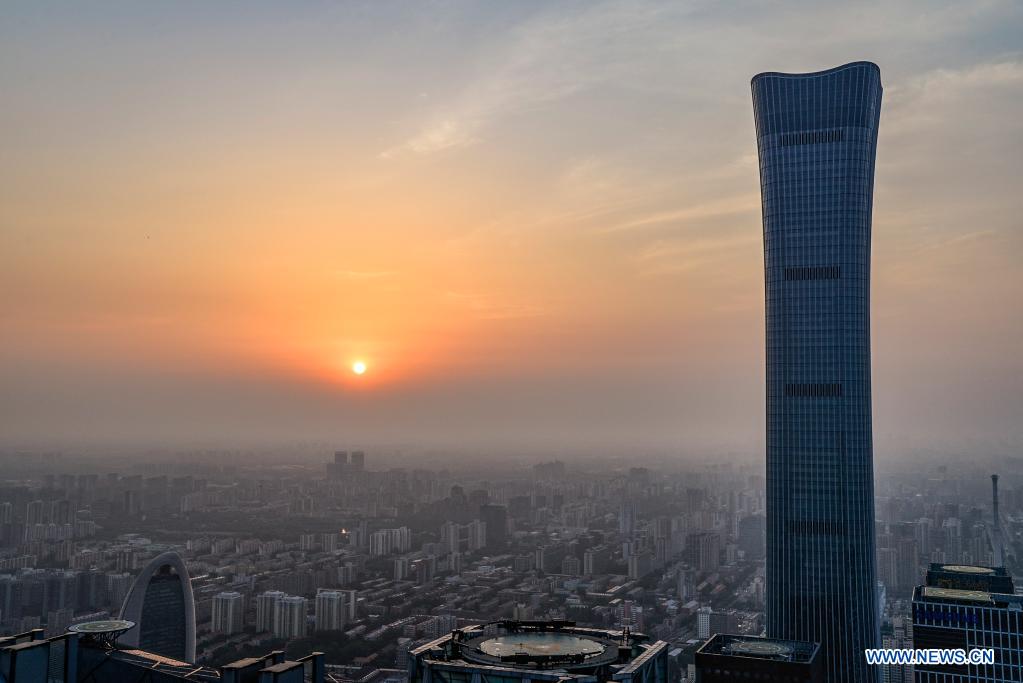 The sun rises in Beijing, capital of China, on July 1, 2021. (Xinhua/Xu Qin)