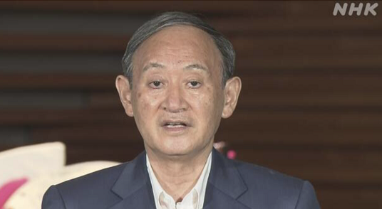 菅义伟13日接受记者提问（图片来源：NHK）