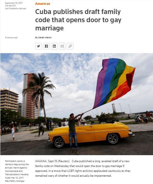 古巴街头反同性恋恐惧症活动参加者挥舞彩虹旗。图源：路透社截图