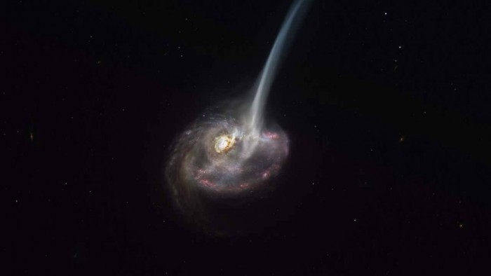 ALMA观测到一个遥远的碰撞星系 它正在释放其恒星形成的气体