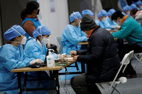 外媒走访北京疫苗接种点 中国加快打造“免疫长城”