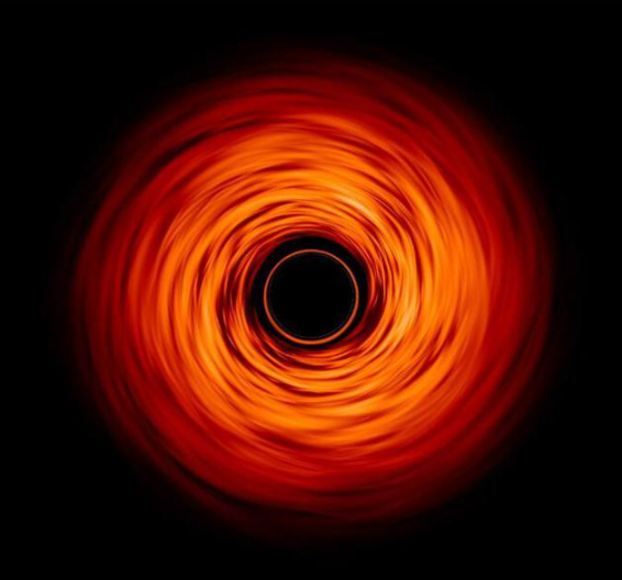 在对黑洞的一个模拟中，强大的引力扭曲了它周围高温发光的气体吸积盘