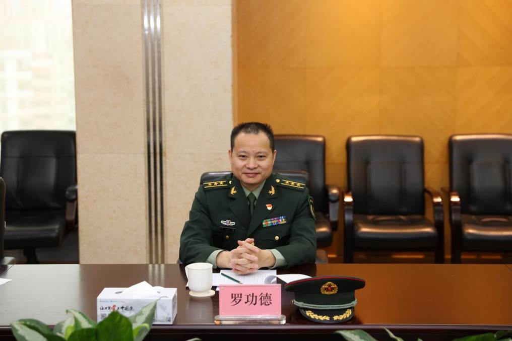 (图为香洲区委常委,区人民武装部部长罗功德讲话)