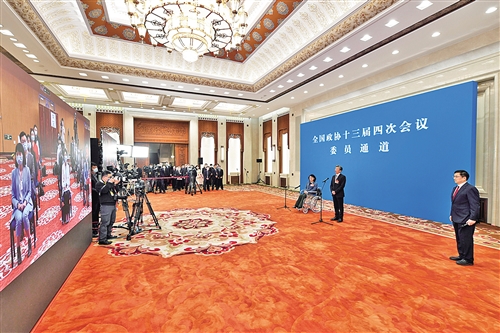 全国政协十三届四次会议首场委员通道开启：聚焦热点 回应关切