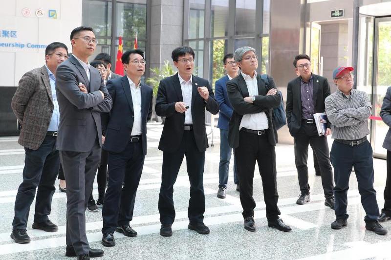 深圳市投资控股有限公司董事长王勇健一行到访上海交大