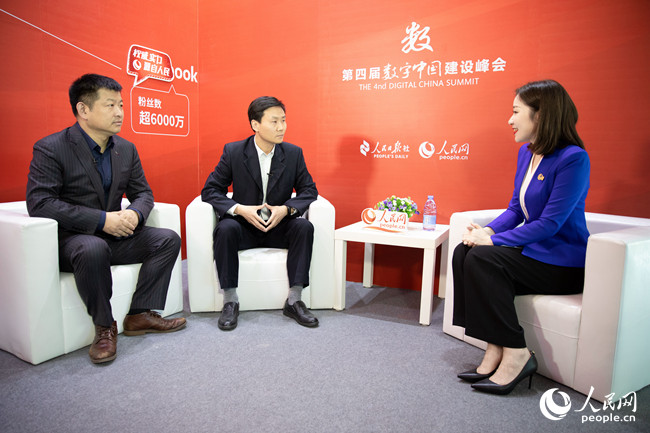 人民网专访中国华录集团华为公司高管构建绿色安全高效的存储系统