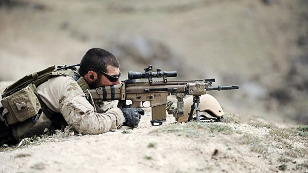 资料图片：美军“海豹”突击队特战队员在阿富汗执行任务。