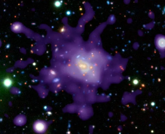 早期宇宙中的星系团（图片来源：P.Rosati et al.; X-Ray: CXC, NASA / Optical: ESO, VLT）