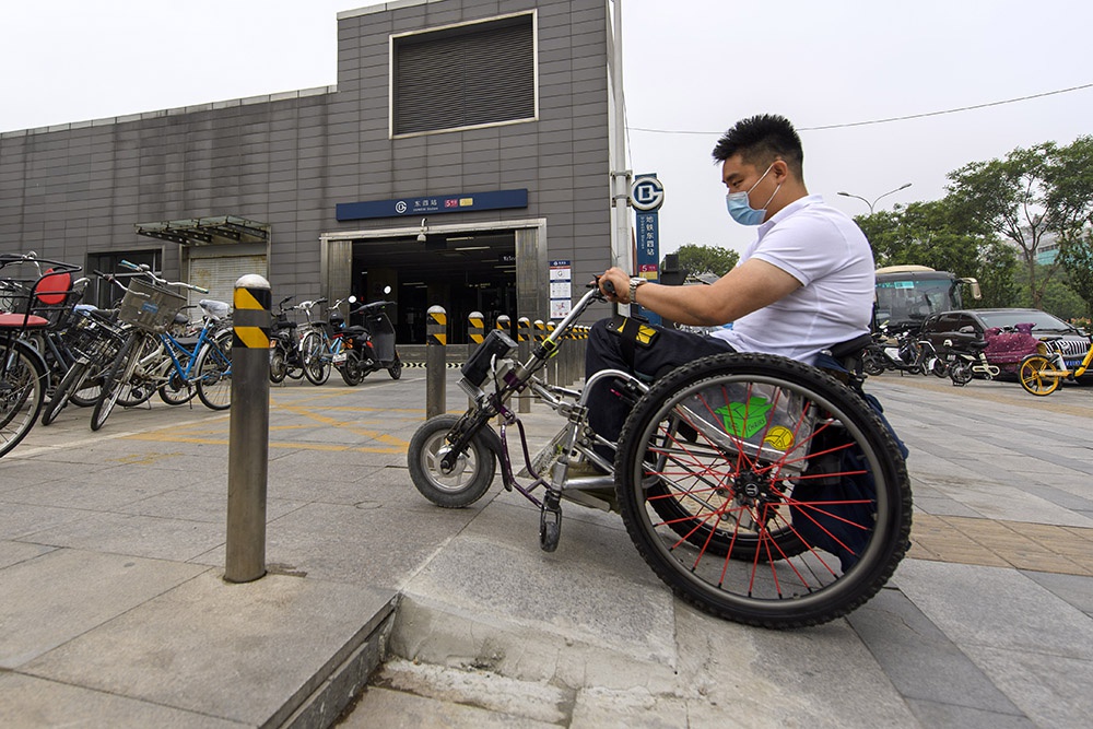 有爱无碍!推进无障碍环境建设 让残疾人生活更便利|人民网_新浪财经_