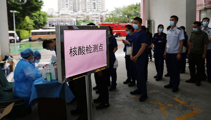 广州市相关单位正在开展核酸检测。图片来源：视觉中国