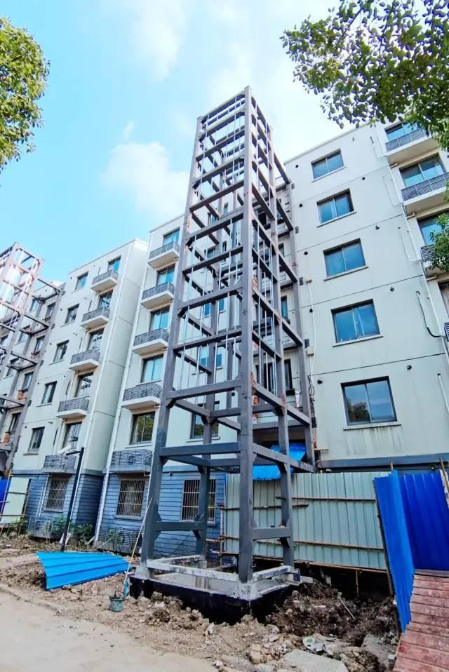 闵行区首个公租房成规模批量化加装电梯项目竣工20部电梯惠及近220户