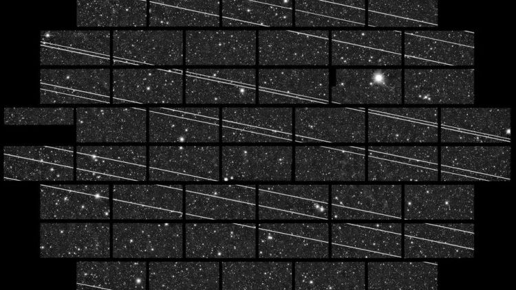 星链卫星的轨迹出现在太空观测红外照片中 图片来源：美国宇航局观测实验室