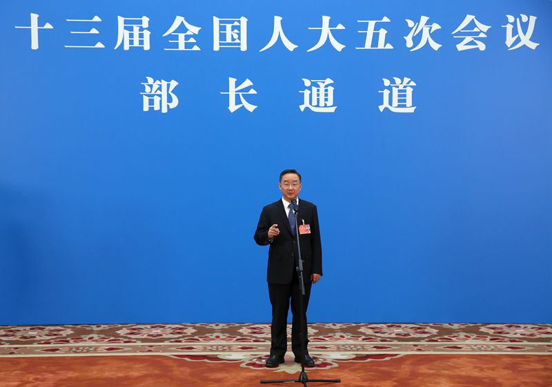 农业农村部部长唐仁健通过网络视频方式接受采访。中国日报记者 王敬 摄