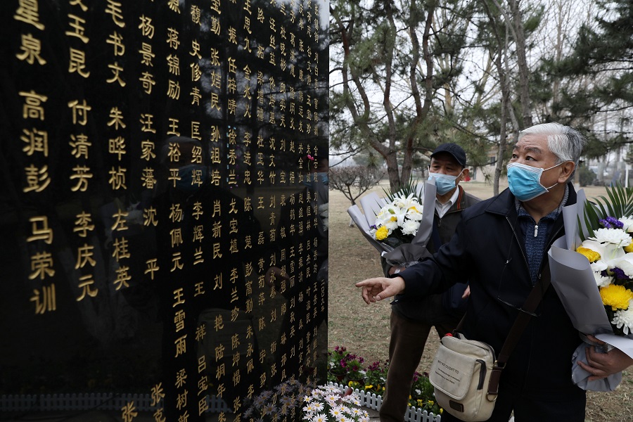 3月24日，捐献者家属在生命追思会现场流泪。中国日报记者 朱兴鑫 摄