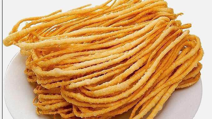 　　(色泽黄亮、香脆可口的撒子)