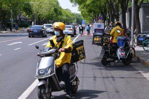 美团增加3成骑手储备启动管控区内循环外卖配送服务