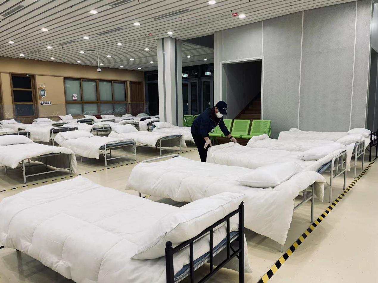 浦东新区政府安排物业与床铺保障快递小哥，共可安置300床位