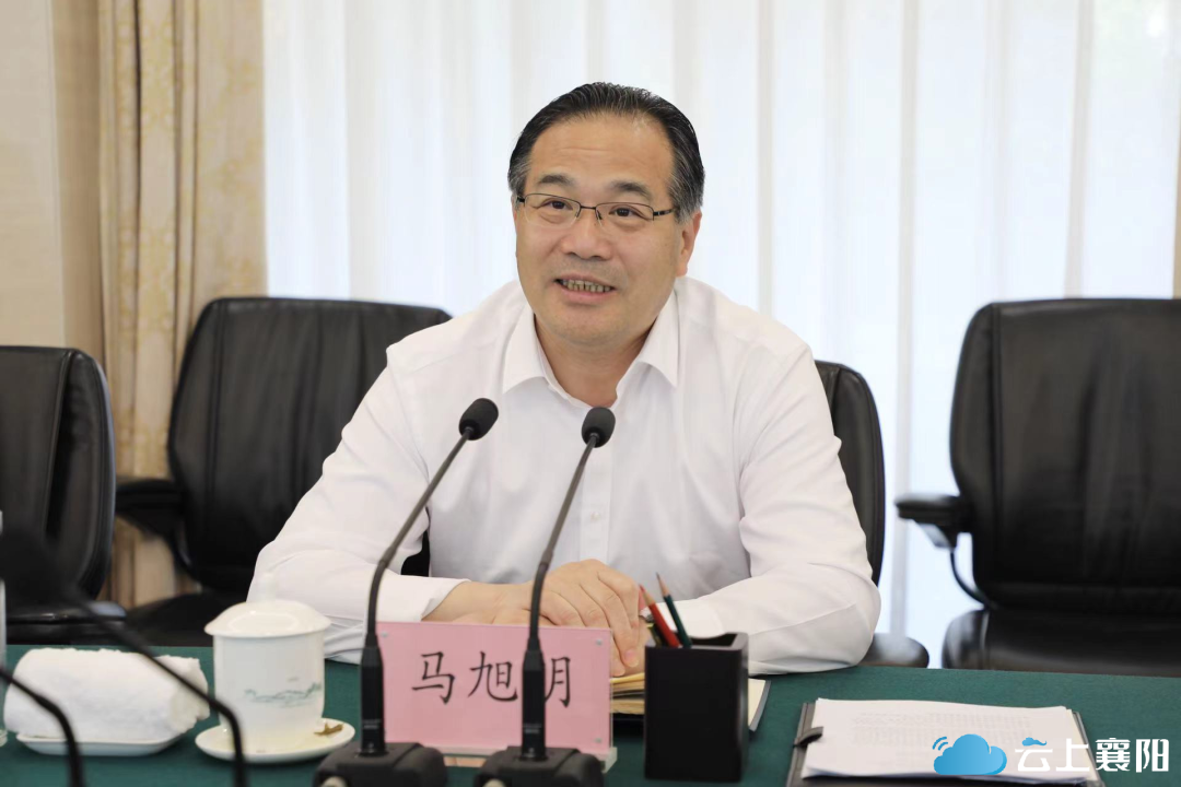 马旭明与张永伟就加快推进襄阳汽车产业转型发展进行座谈