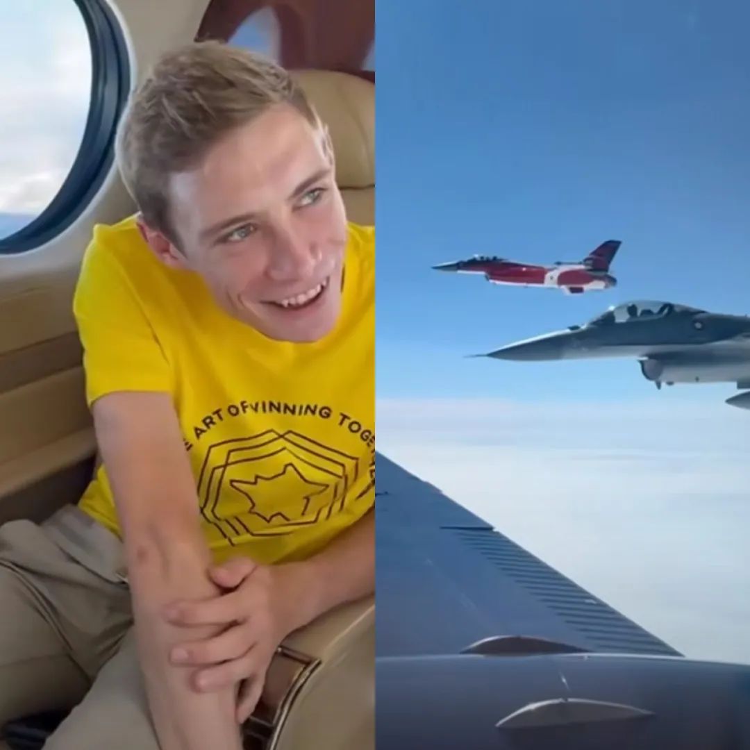 ·温格高腼腆而又好奇地看着专机窗外，为他护航的是丹麦皇家空军。