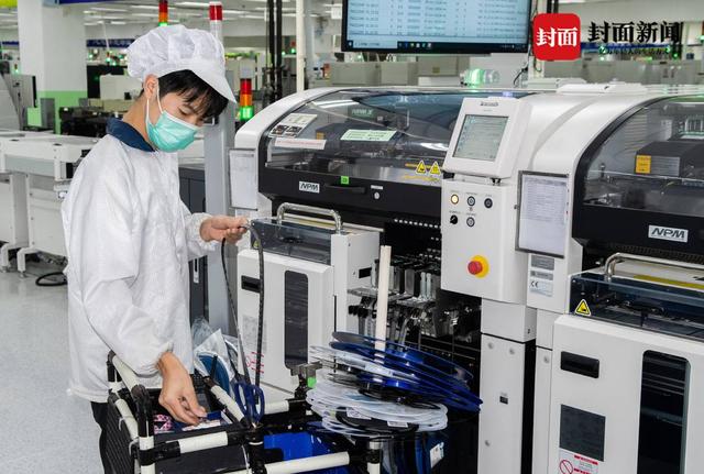 9月22日上午,成都仁宝电脑的生产车间内秩序井然