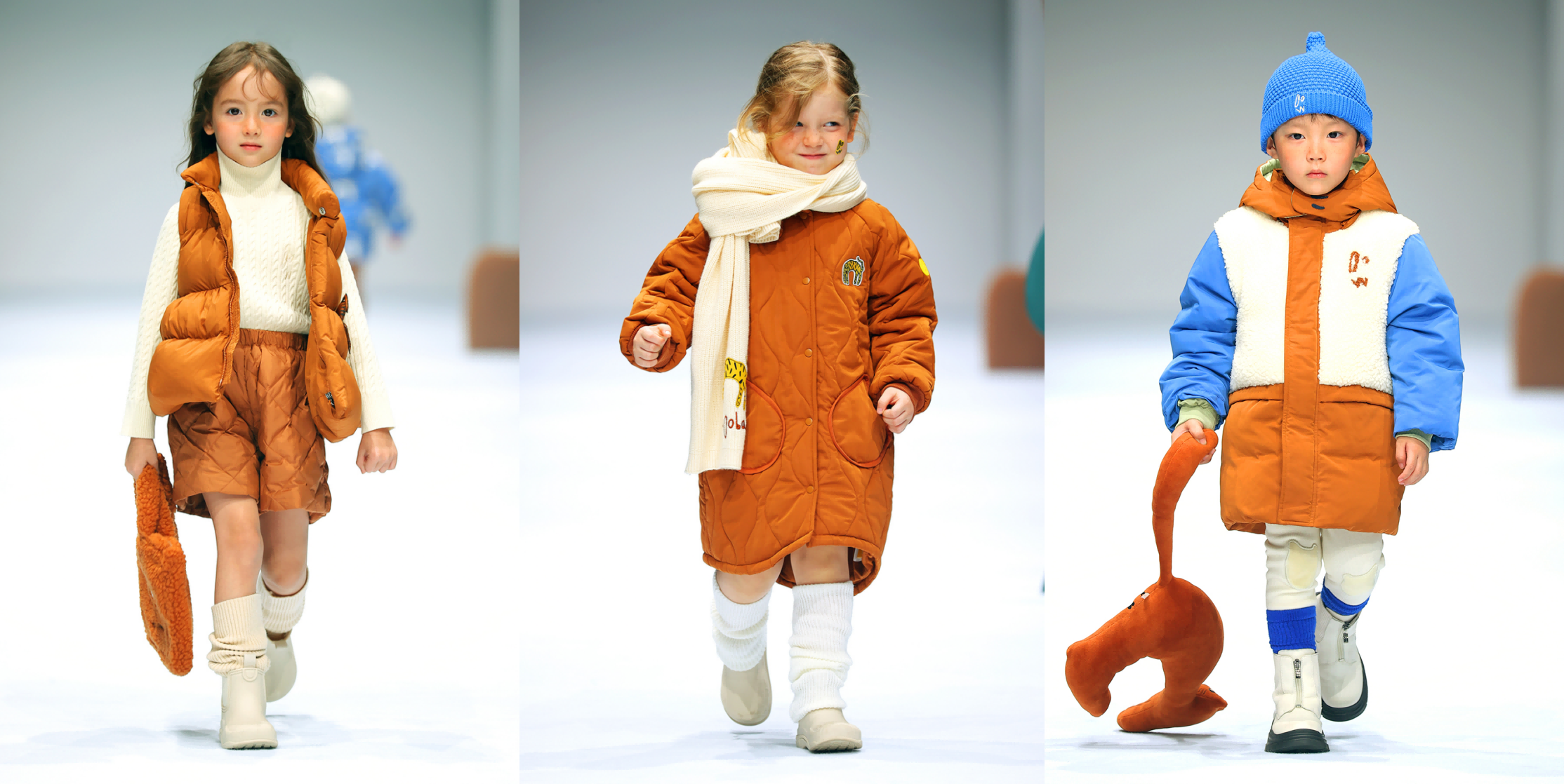 (图为woobaby在上海时装周大秀上发布的秋冬新品童装)