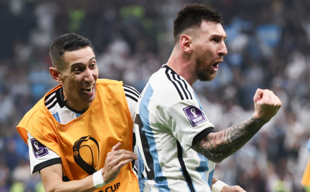 梅西和迪马利亚庆祝进球.&nbsp; 图/新华社