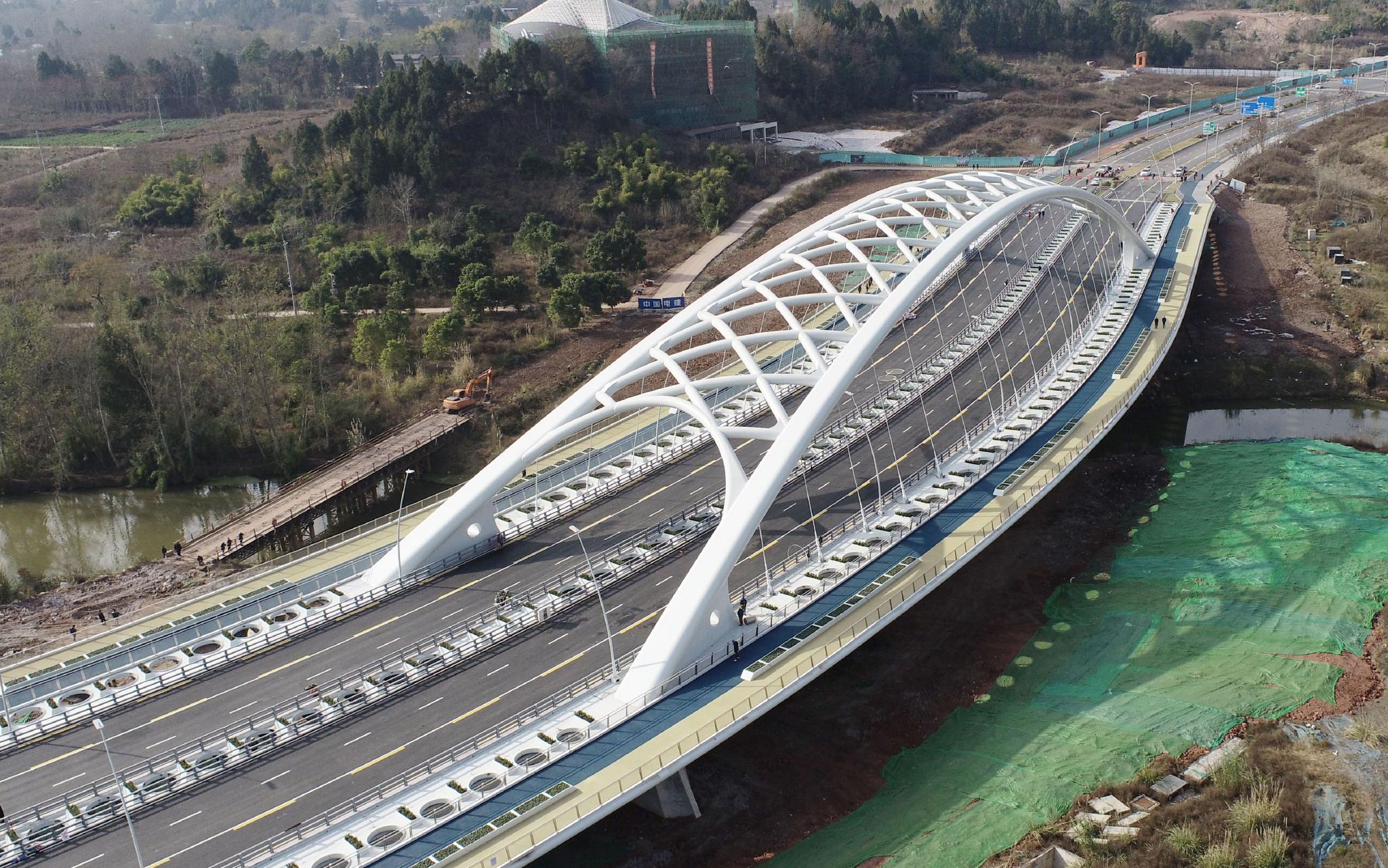 国内首座空间网状弯曲拱桥建成通车_新浪财经_新浪网