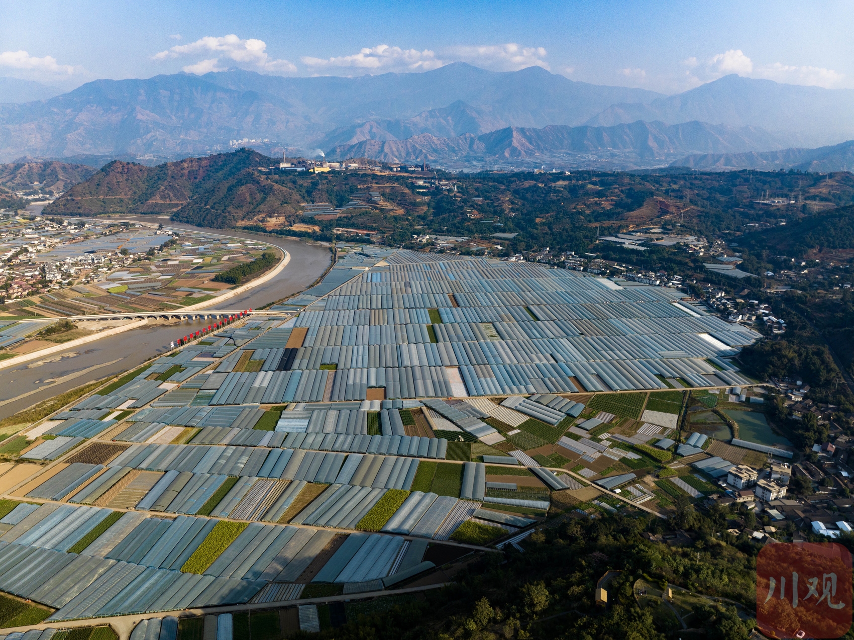 航拍安宁河畔的攀枝花米易县10万亩稻菜轮作基地核心区.