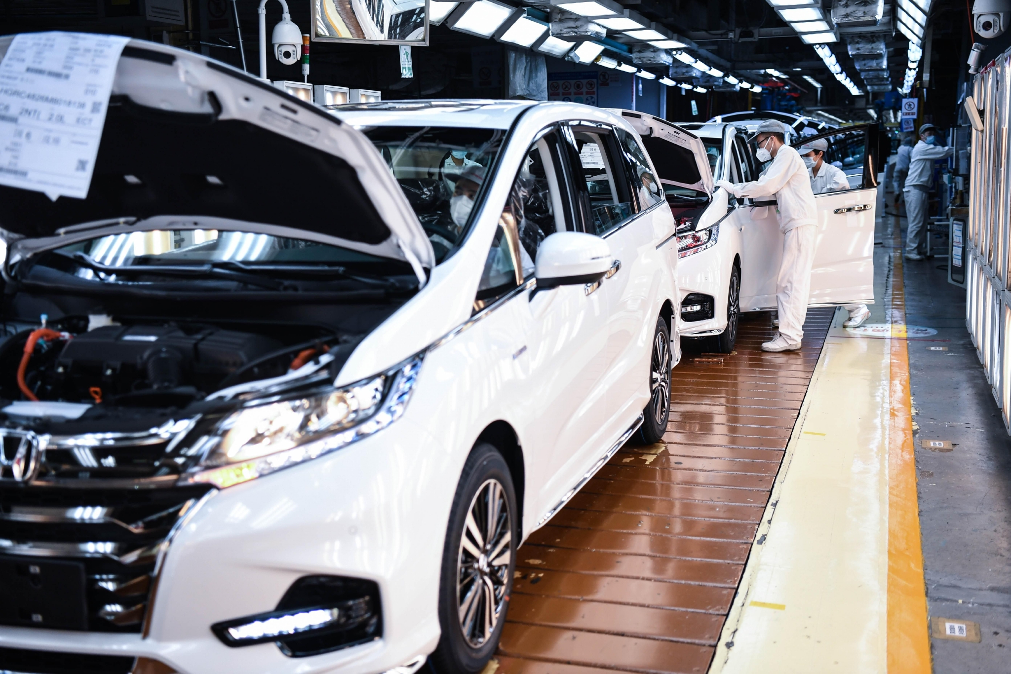 广汽本田汽车有限公司车间生产线(2021年3月4日).图/新华社
