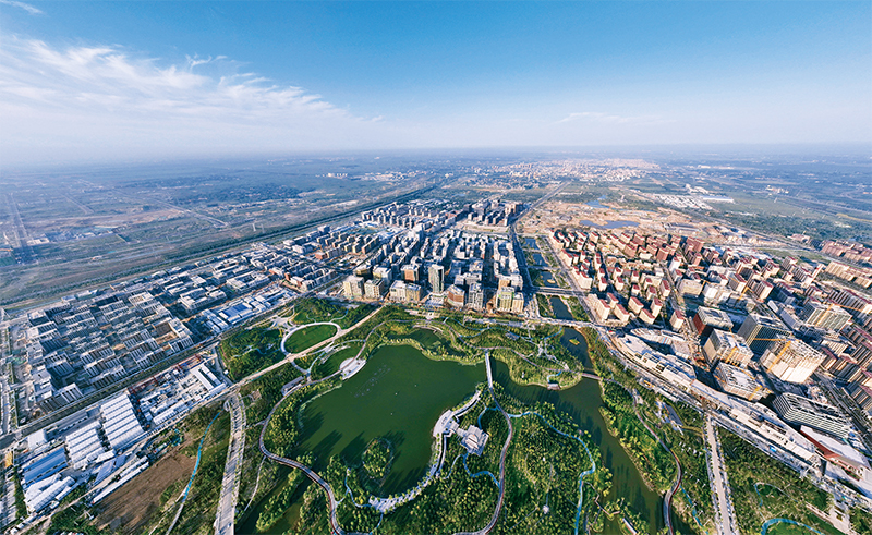 在广袤的冀中平原，一座承载千秋大业的“未来之城”正拔地而起。图为清晨时分的雄安新区容东片区（2022年9月8日摄）。 新华社记者 邢广利/摄