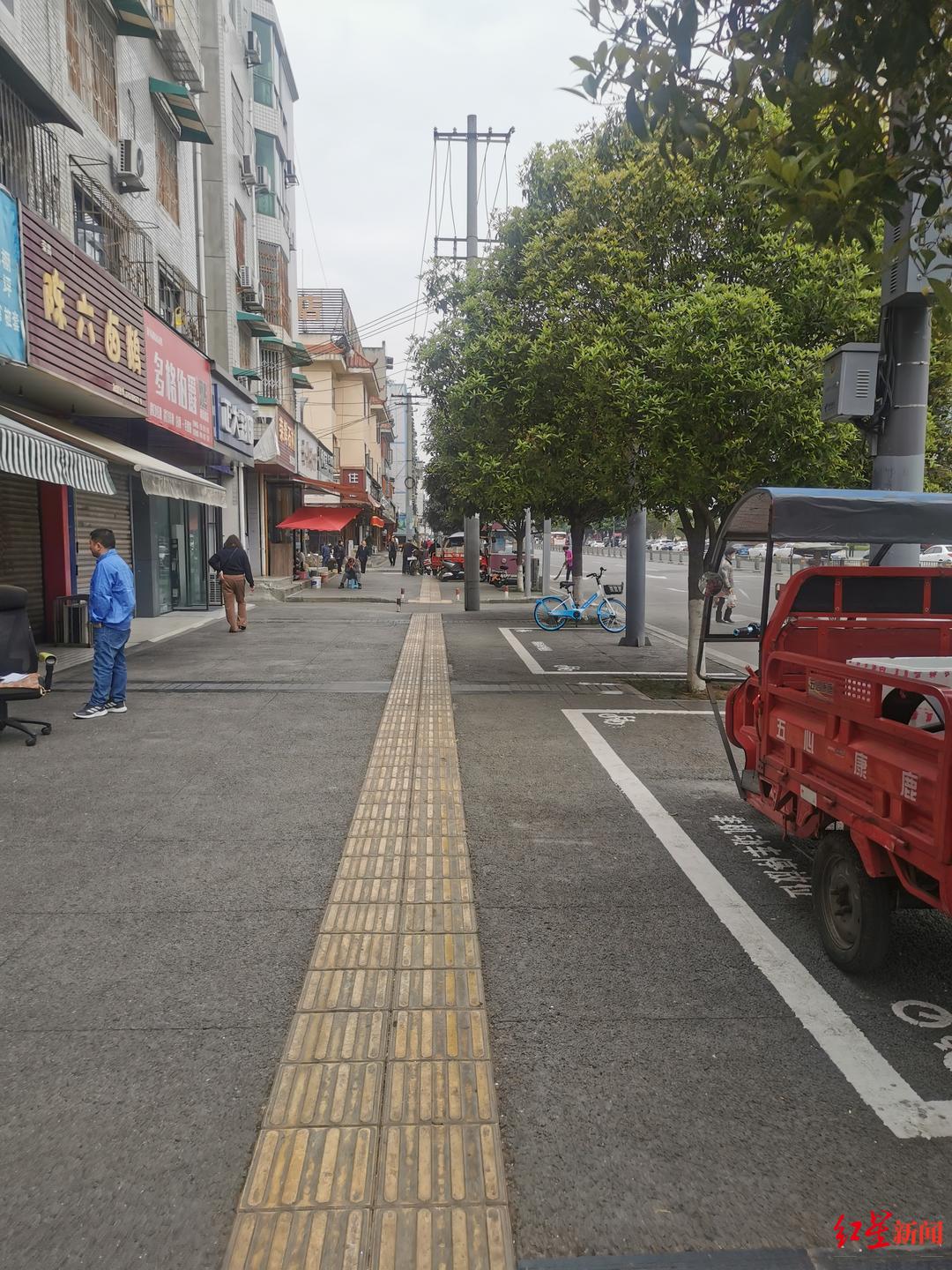 非机动车：回访追踪长江街菜市占道经营等不文明现象已改善