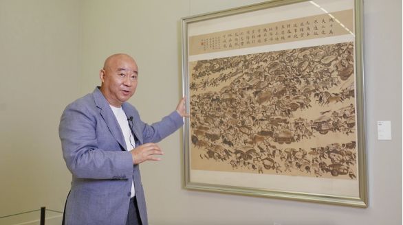 图:范扬和他的获奖作品《支前》.