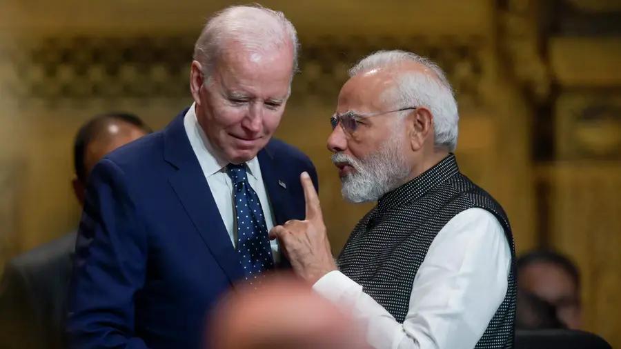 资料图:拜登与莫迪(右)