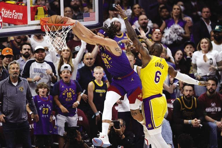 掘金球员阿隆·戈登扣篮.新华社照片