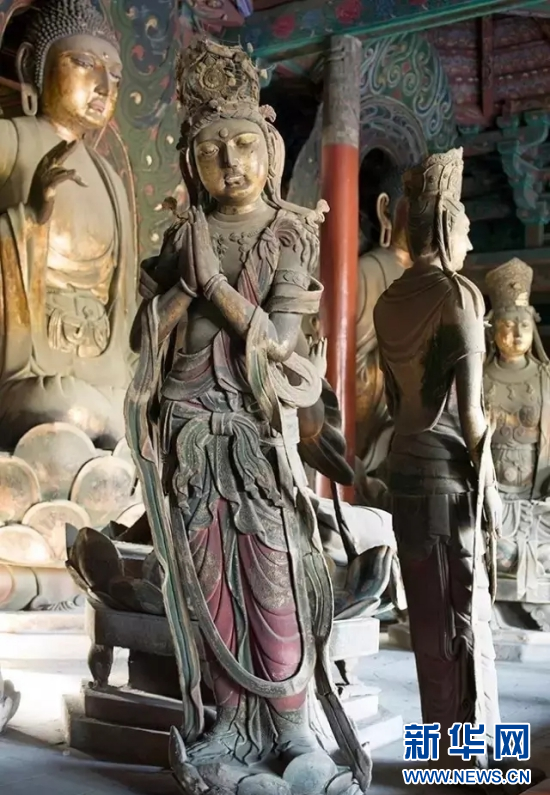 华严寺的合掌露齿菩萨.新华网 发