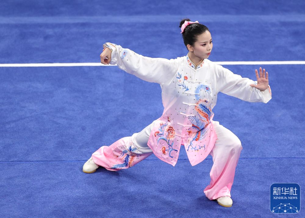 王曦 摄7月29日,在成都第31届世界大学生夏季运动会武术女子太极拳