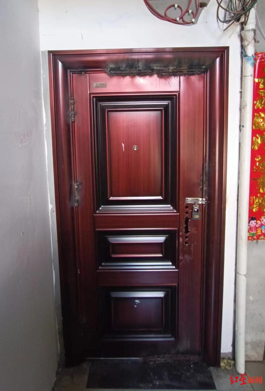 涉事房屋房门被焊死&nbsp;红星新闻记者&nbsp;张杨摄